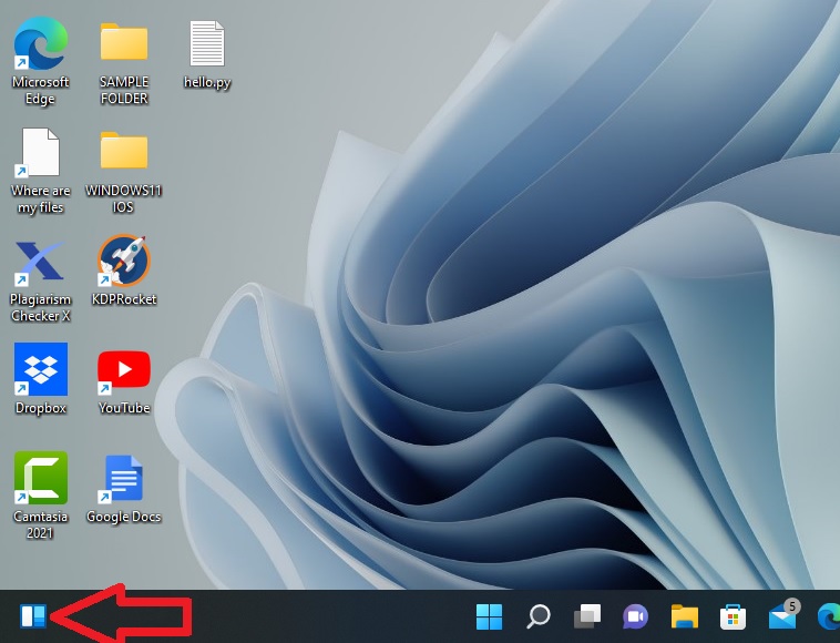 The Windows 11 Widgets in picture indicated by the arrow
